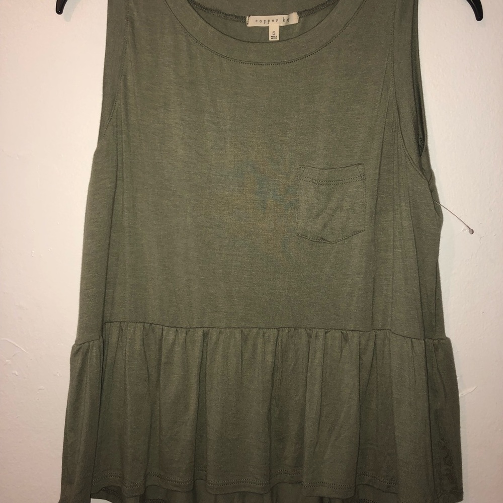 Sleeve less peplum shirt brand new